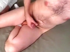 He jerks off into condom