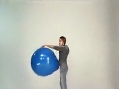 Emily Addison blow blue balloon