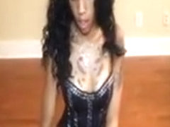 Ebony babe in corset loves wanking cock