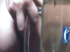 Chick pisses in a glass and rips a few farts