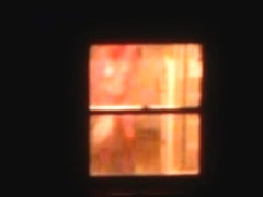 Naked neighbour woman at the window