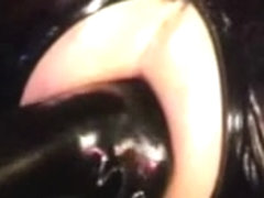 Sissy serf in latex gets femdom fisting action