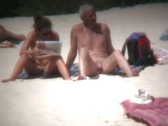 Sexy babes at the beach are playing on camera