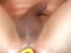 Anal insertion of insane devil's dildo