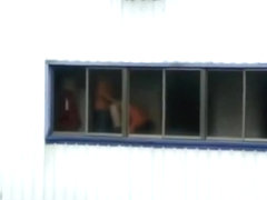 Voyeur captures a couple fucking in the factory, instead of working !!!