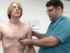 Doctor examining male patients penis