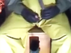 Wank in yellow rubber.