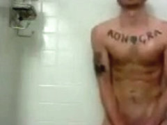 hunky tat man in shower