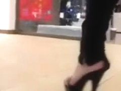 teen heel flashing in mall