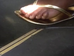 Sexy ebony feet in gold flip flops pt.2