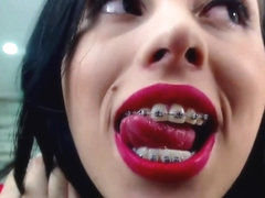 sexy latina with red lips and metal braces, super hot!