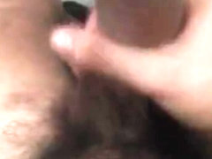 Watching porn and cumming on the wall