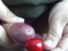Uncut cock cumming twice on a cherry