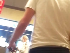 Candid cheeks in little shorts in line