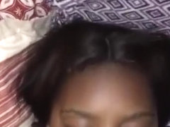 Young ebony enjoying a throat massage