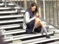 Asian schoolgirl on a break got skirt sharked while texting