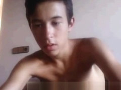 two straight asian teens jerking each other