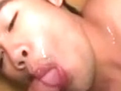 Slutty asian boy jerks while giving a head