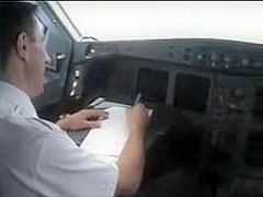 french stewardess exposes her big tits in the cockpit