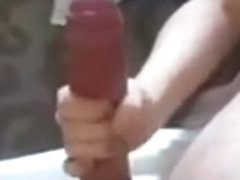 She plays with cumming cock