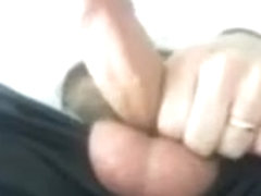 Dad stroking uncut cock at work