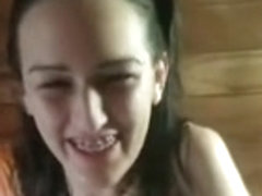 Cute Girl in Pigtails and Braces Squeals at Ice Water Torture in Sauna