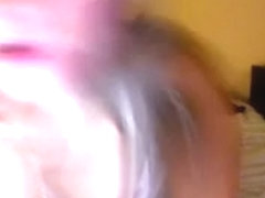 Lewd golden-haired skank on webcam sucking and fucking herself