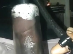 Penis pump. Fat dick drips cum