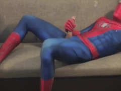 Horny Spiderman jerks off and cums massive load