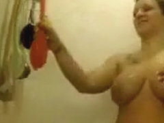 Big titted Breanne masturbates in the shower