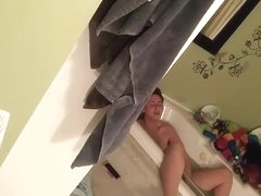 Sister caught rubbing pussy in a bath