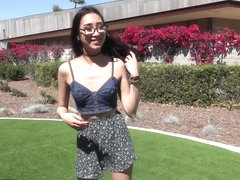 Nerdy teen asian Eva Yi flashes her tits in public