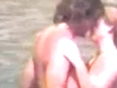 Naked couple at beach - voyeur video