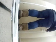 Teen in jeans caught peeing