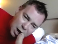 Middle aged deviant blows white and black dick at same time