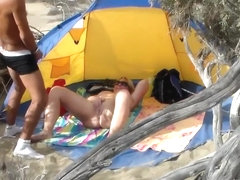 Mature nudist woman has her vagina licked and drilled in the tent