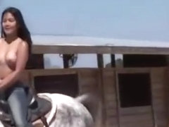 My naked asian girlfriend riding horse