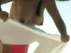 Busty nude beach babes filmed by a voyeur