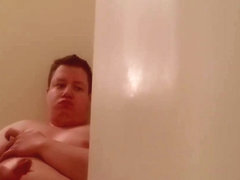 Chubby boy pisses and cums