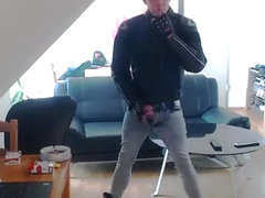 Smoke in constricted jeans and dainese biker leather jacket