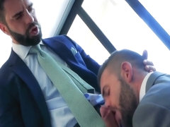 two guys in suits fuck