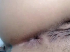 Woman Oils Up Her Body