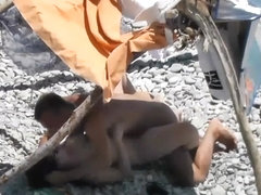 Voyeur on public  beach sex