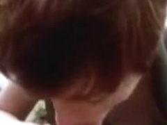 Ryanne blows outdoors