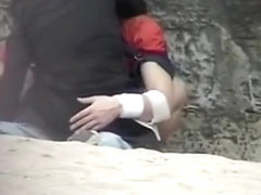 Voyeur captures 2 couples having sex during daytime at the beach