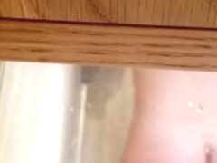 Hidden cam under shelf