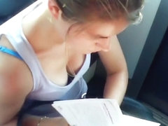 Great cleavage on a chick reading on the train