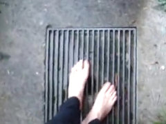 In long Zivalco Rubberboots and barefoot on Street and River