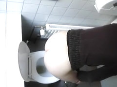 Woman caught in public toilet peeing