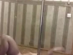 Caramelca dancing with a pole